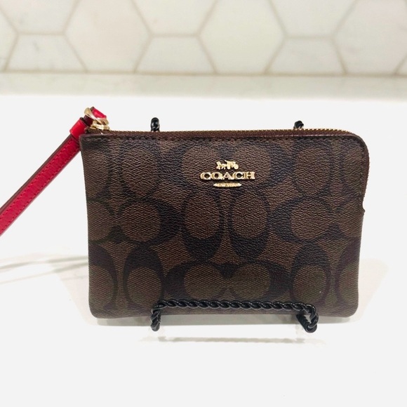 Coach Handbags - Coach Signature Brown Wristlet with Red Strap NWOT